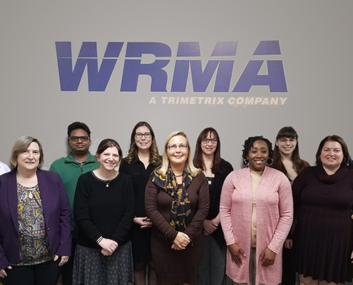 A group photo of WRMA's NCANDS team in 2018 at the WRMA office.