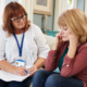 woman making a house call to support a woman during an interview.