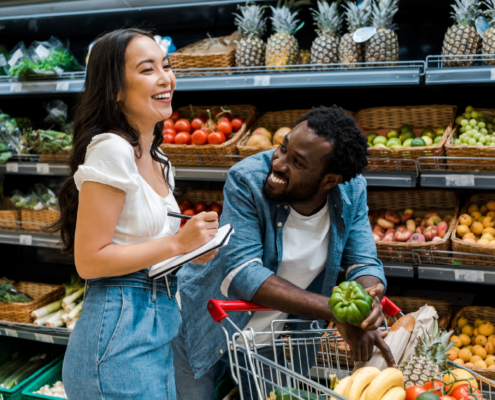 Couple enjoying shopping at the grocery store